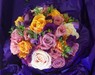 Vibrant rose, freesia and eustomia posy